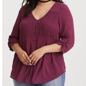 Brand new torrid blouse. Gauze with ruching detail